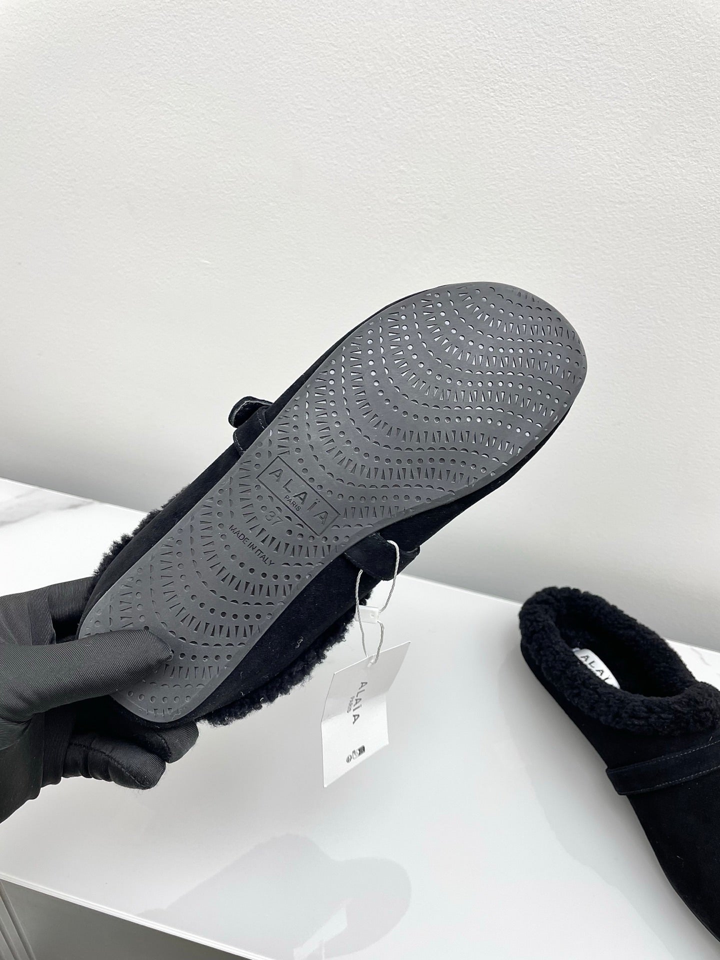 ALAIA 26S MULE IN BLACK SUEDE AND WOOL