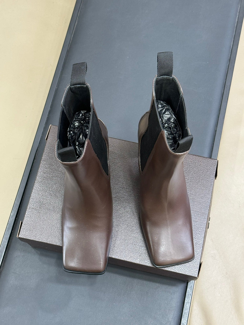 ALAIA 25S ANKLE HIGH-HEELED BOOTS IN BROWN CALFSKIN AND CANVAS