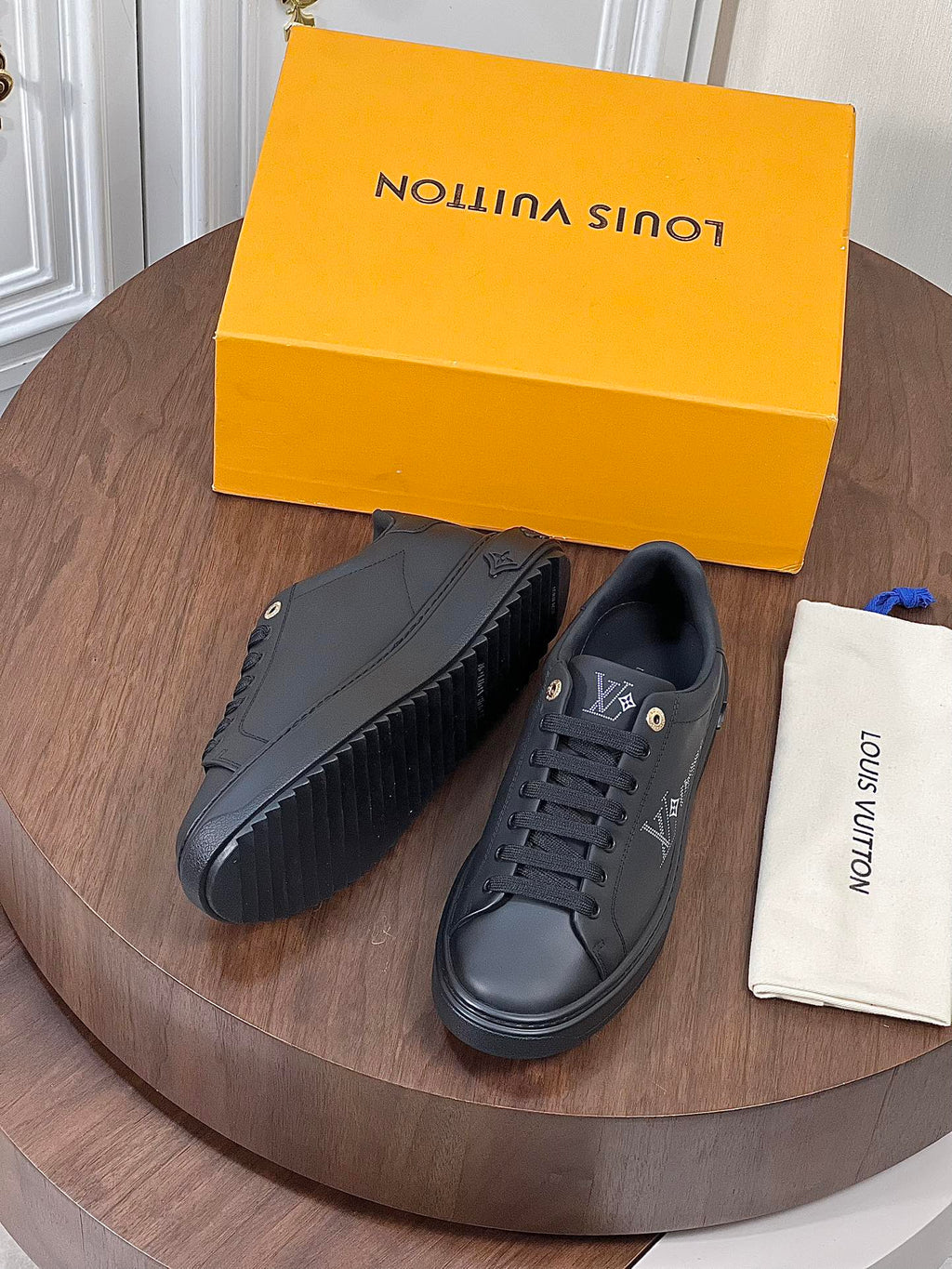 LV TIME OUT SNEAKER IN BLACK CALFSKIN