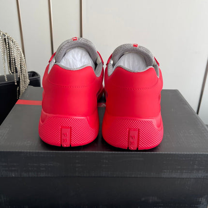PRADA 26S AMERICA CUP SNEAKERS IN RED SOFT RUBBER AND BIKE FABRIC