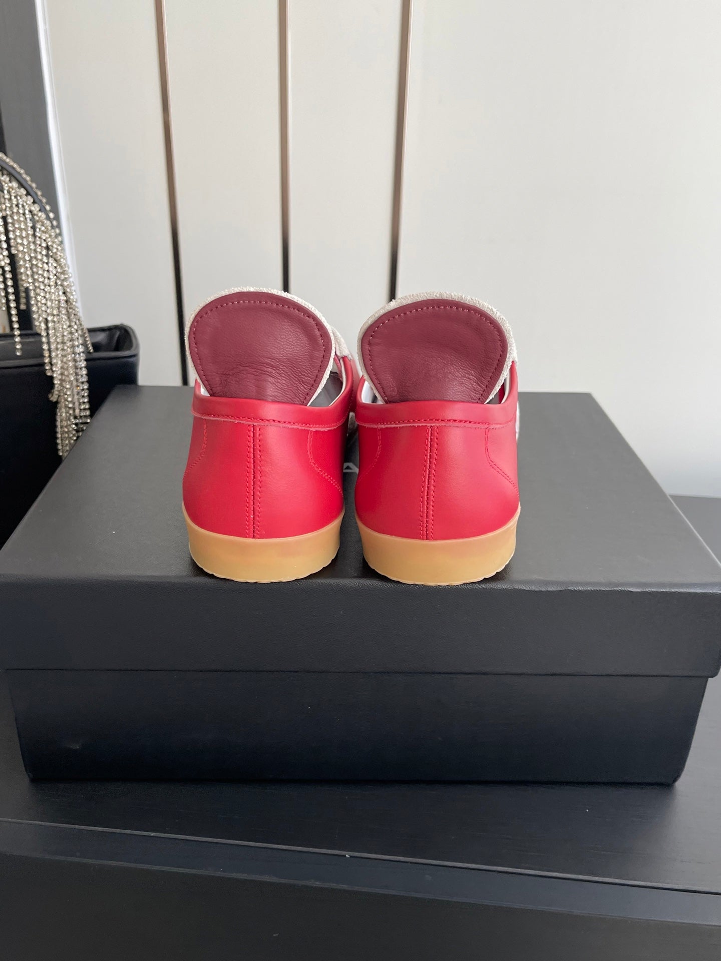 CHANEL LOW-TOP SNEAKERS IN RED CALFSKIN MIX SUEDE