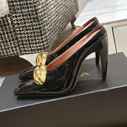 ALAIA SPIKE JEWEL MULES IN BLACK GLOSSY CALFSKIN WITH GOLD HARDWARE