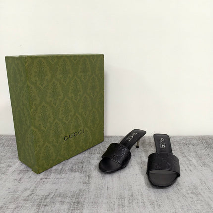 GUCCI 26S MULE SANDALS 55MM IN BLACK CALFSKIN GG EMBOSSED