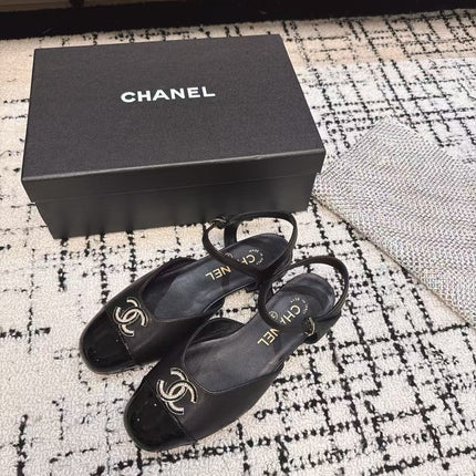 FLAT SLINGBACKS IN BLACK CALFSKIN