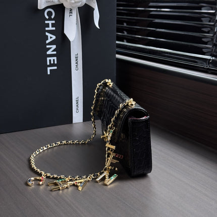 CHANEL 26S WALLET ON CHAIN 22 IN BLACK CROCODILE-EMBOSSED CALFSKIN GOLD HARDWARE