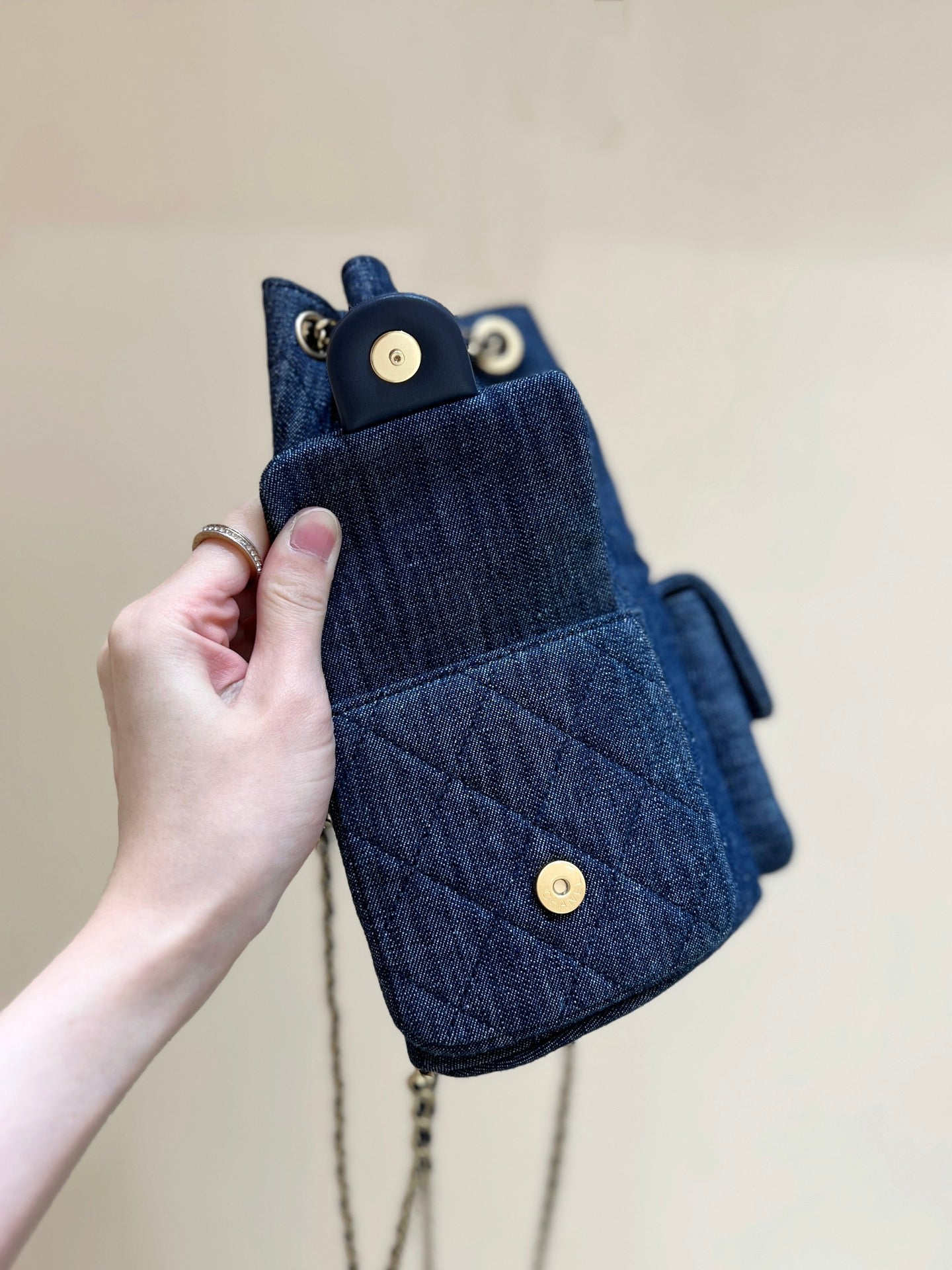 DRAWSTRING BUCKET BACKPACK 24 IN DARK BLUE DENIM GOLD HARDWARE