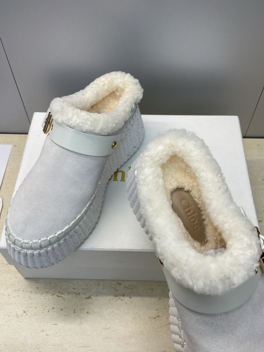 CHLOÉ 26S FUR-LINED WEDGE MULES IN LIGHT GREY SUEDE