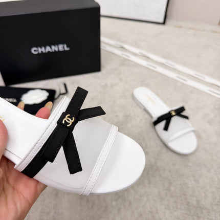 CHANEL 26S SLIDE SANDALS IN WHITE MESH AND CALFSKIN WITH BLACK RIBBON