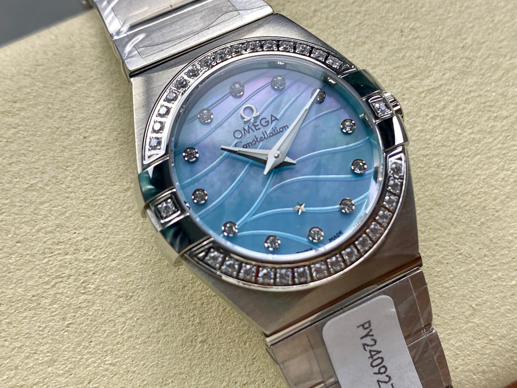 CONSTELLATION PETITE WATCH SILVER CASE AND SAPPHIRE BLUE DIAL WITH CRYSTAL