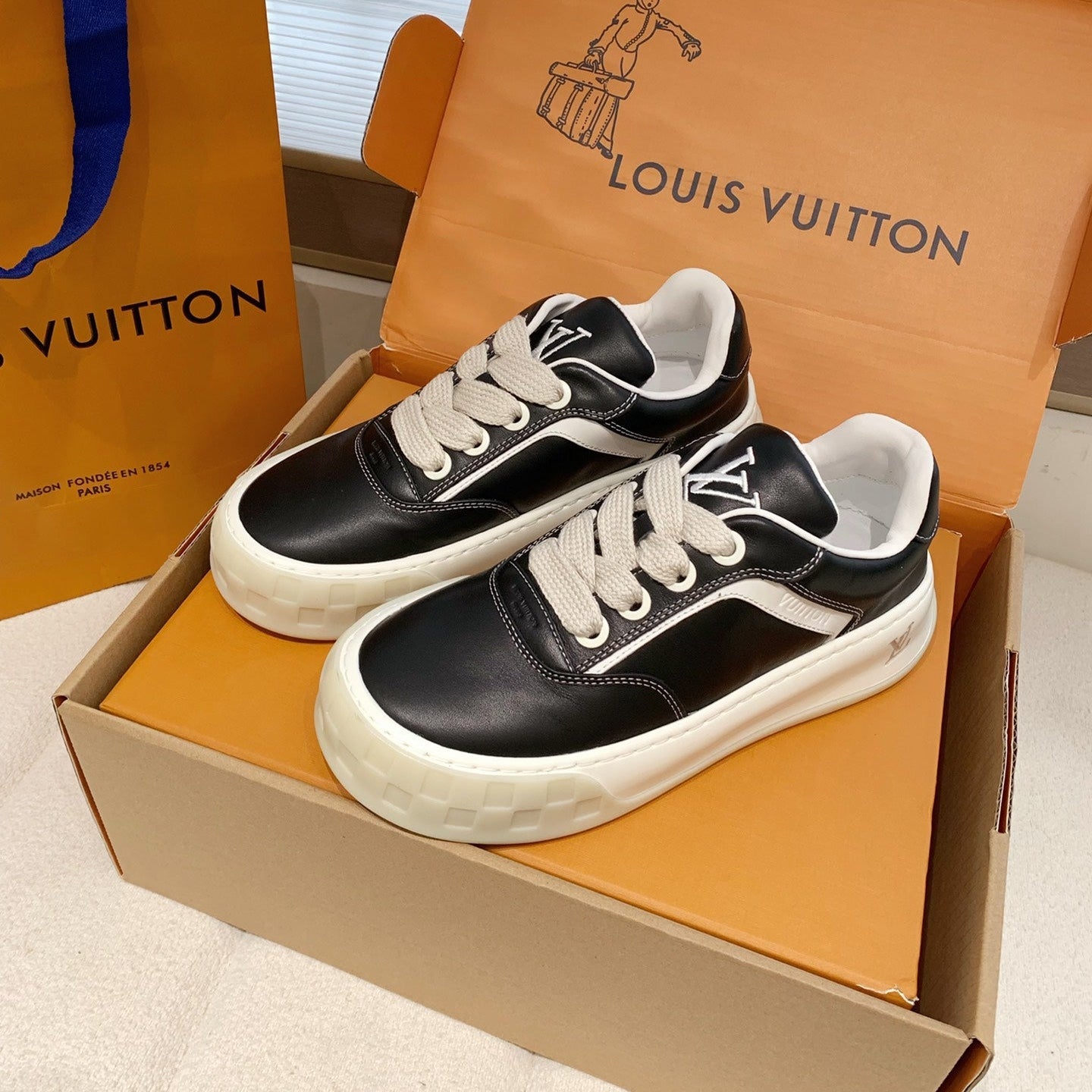 LV 26S TILTED SNEAKERS IN BLACK CALFSKIN