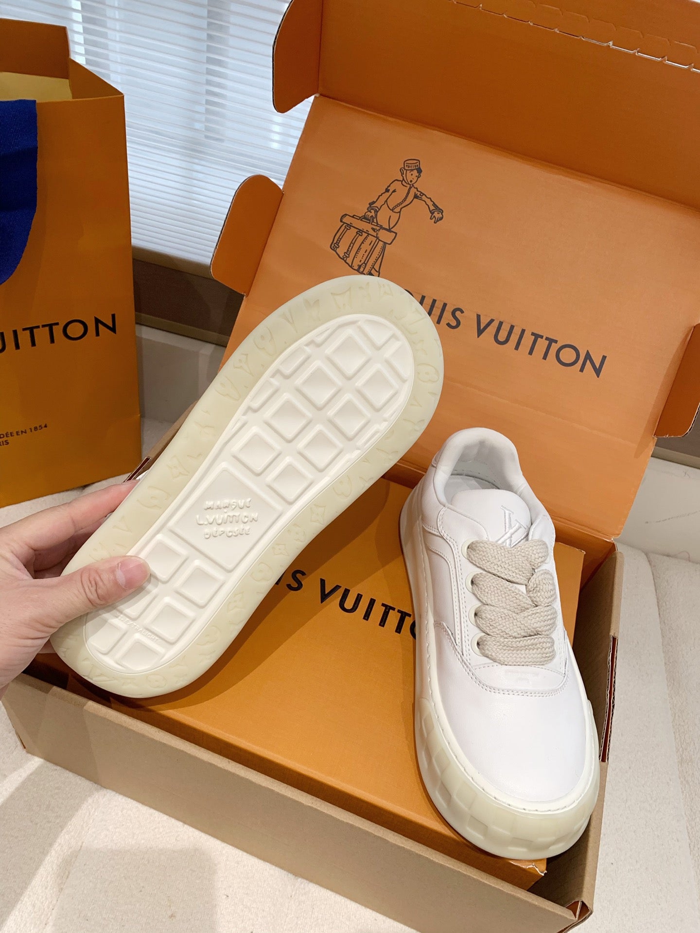 LV 26S TILTED SNEAKERS IN WHITE CALFSKIN