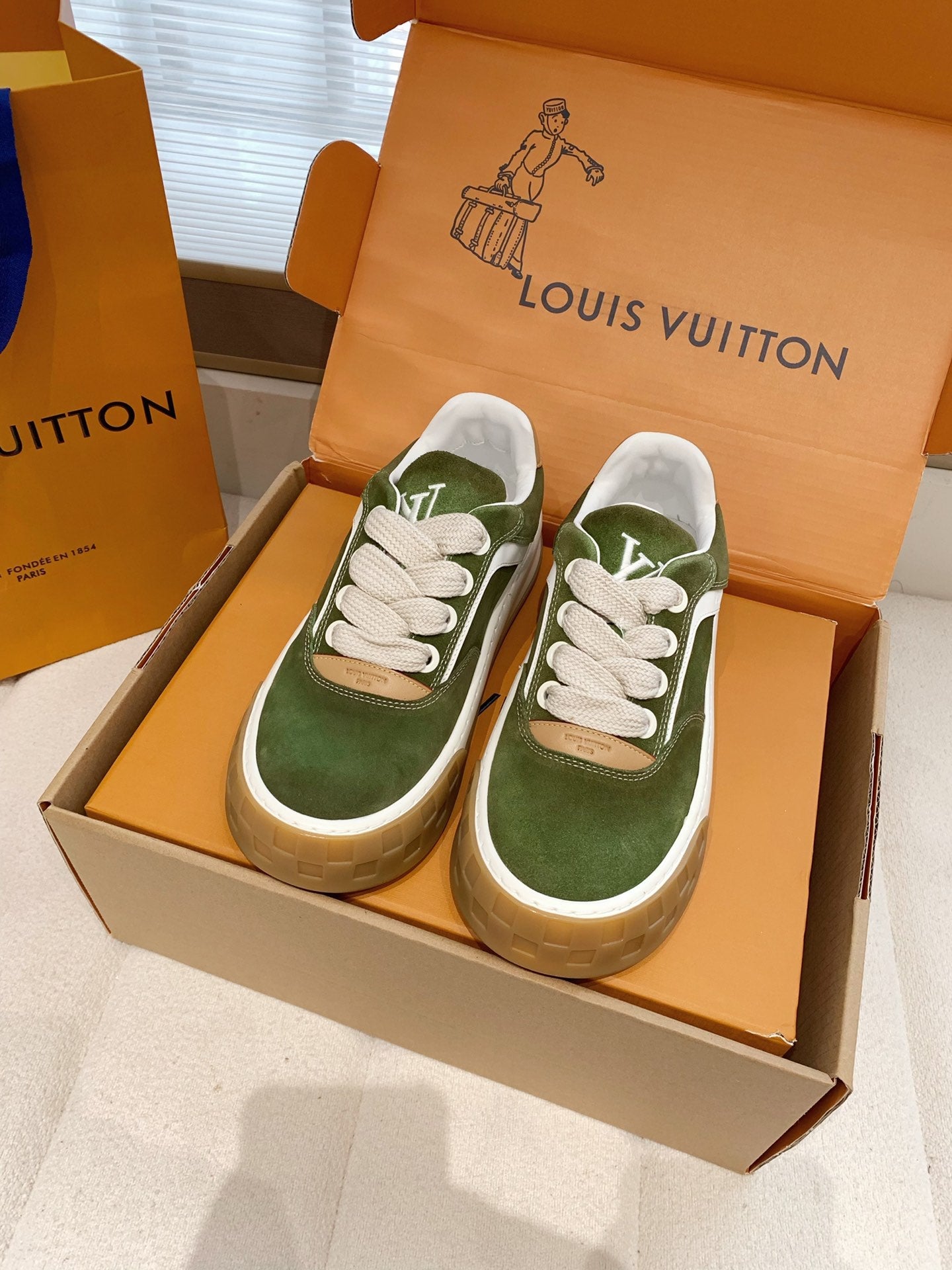 LV 26S TILTED SNEAKERS IN OLIVE GREEN SUEDE