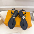 LV SUNKISS T-STRAP SANDALS IN BLACK CALFSKIN GOLD-TONE ACCESSORY.