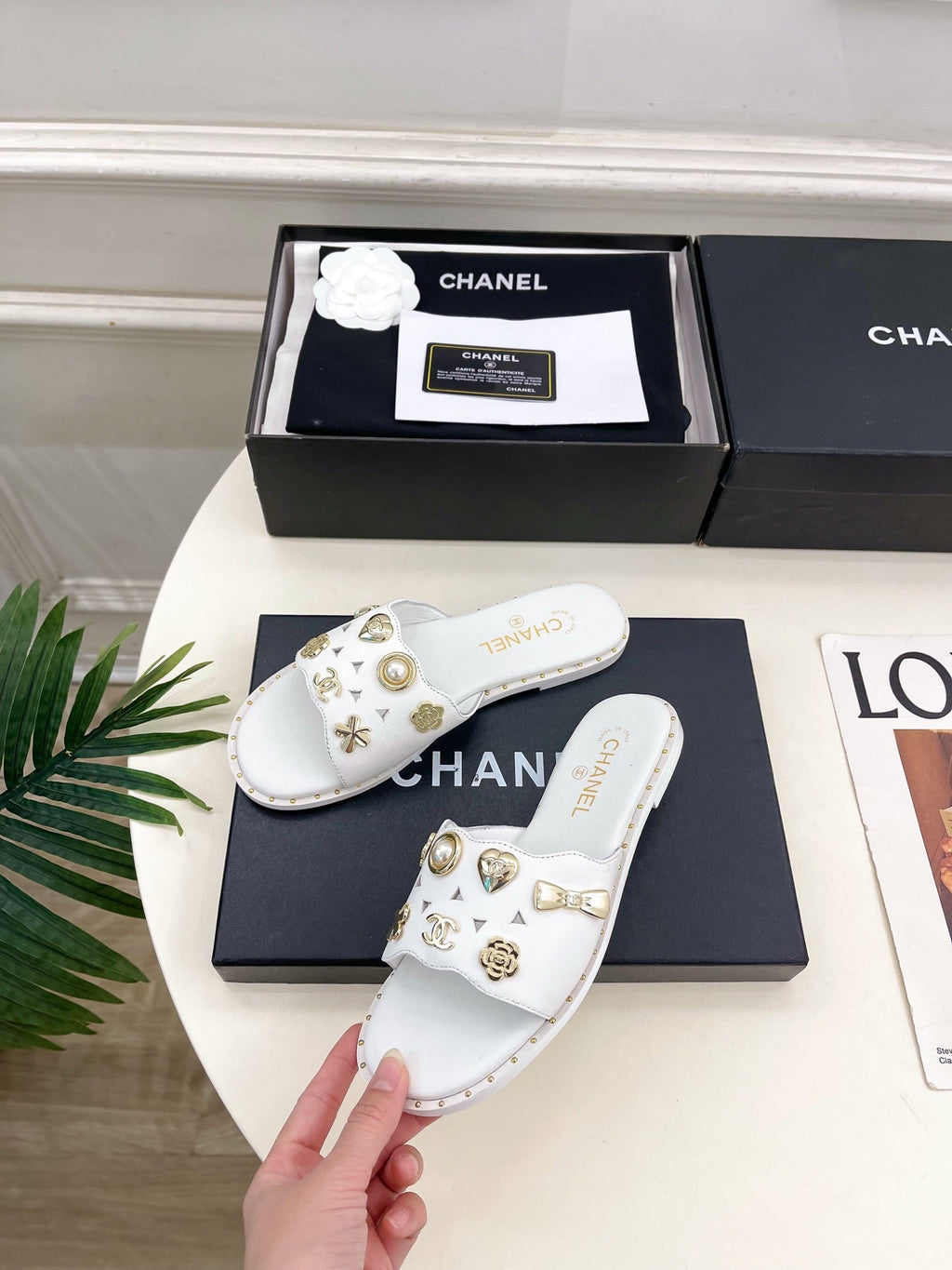 CHANEL 26S FLAT SANDALS IN WHITE LAMBSKIN CHARM-DECORATED