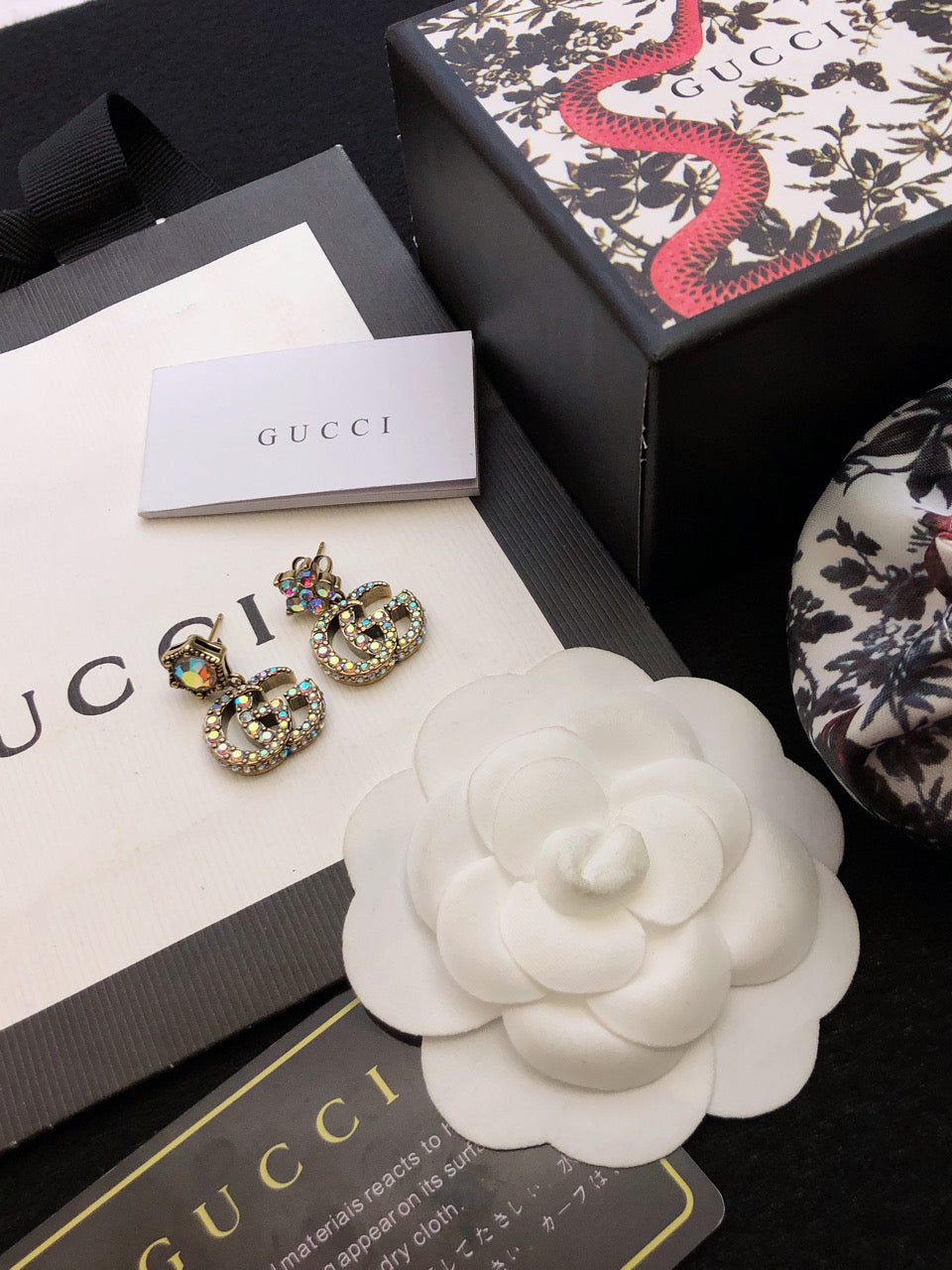GUCCI 26S DOUBLE G LOGO MULTICOLOR CRYSTAL DROP STATEMENT EARRINGS IN AGED GOLD TONE METAL 629027
