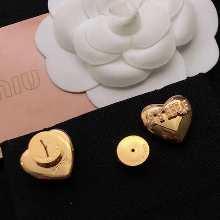 MIUMIU 26S PEARL LOGO HEART STUD EARRINGS IN GOLD TONE METAL 612685