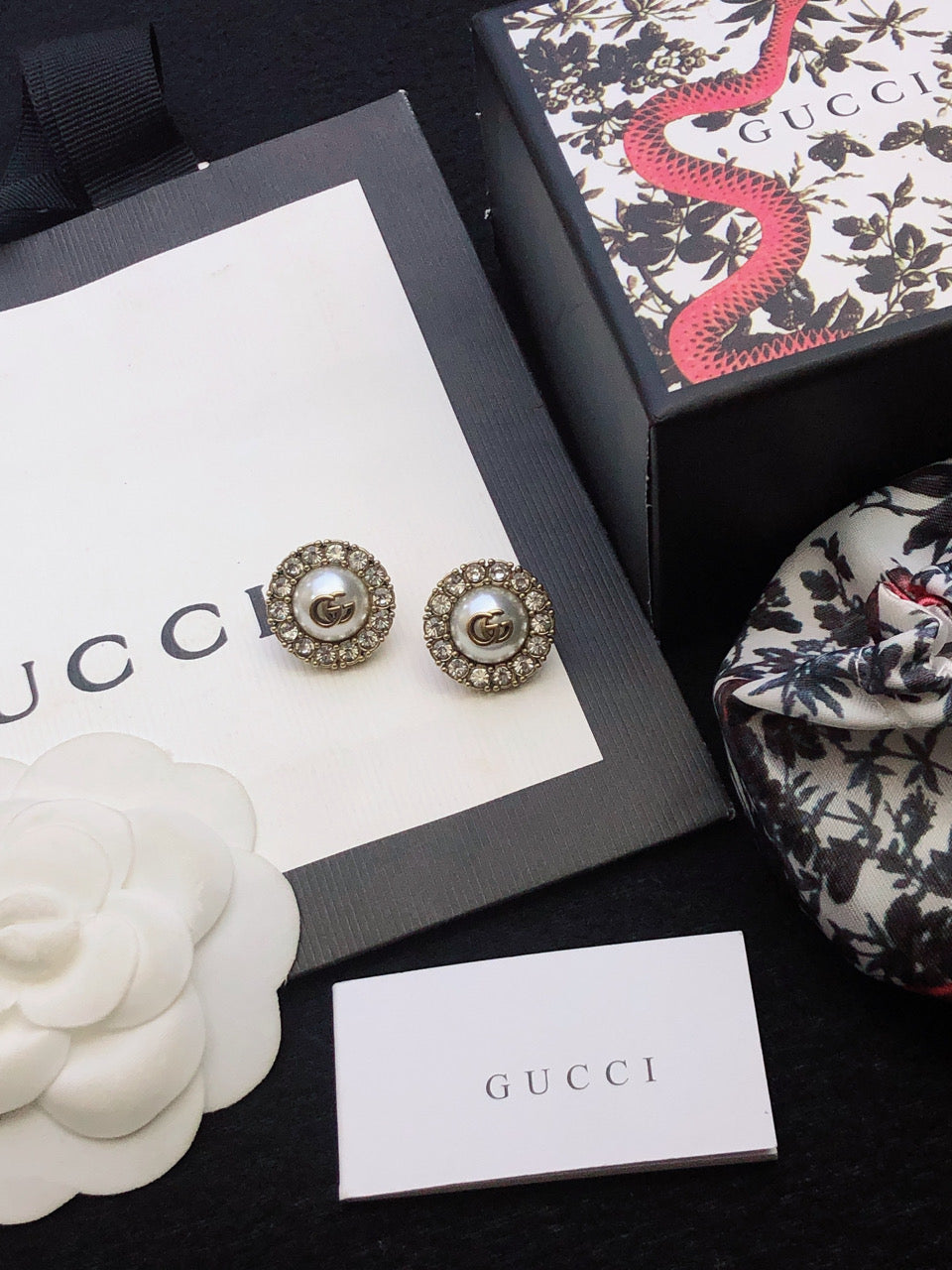 GUCCI 26S DOUBLE G LOGO PEARL CRYSTAL HALO STUD EARRINGS IN AGED GOLD TONE METAL 629031